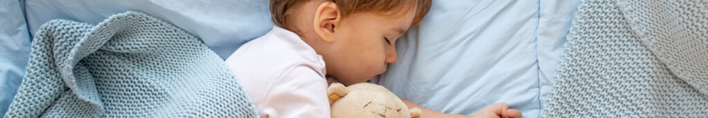 Child resting in a San Bernardino, CA area home